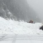 Plows clear snow brough down by avalanche control on US 2 Stevens Pass. (Photo courtesy of WSDOT/Twitter)