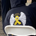 The back of a sweatshirt honoring those lost in the Oso landslide. (Hanna Scott, KIRO Radio)