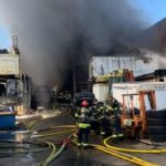 Crews battle a fire along Aurora Ave. at 109th Street on Wednesday. (Seattle Fire)
