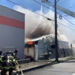 Crews battle a fire along Aurora Ave. at 109th Street on Wednesday. (Seattle Fire)