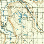 Lake Tapps was a community and small lake before a larger lake was created (from a total of four small lakes, including Kirtley Lake) beginning in 1909. (USGS Archives)