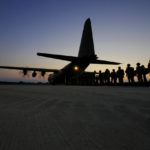 
              British paratroopers with the 16th Air Assault Brigade line up to board a C-130 transport aircraft at RAF Akrotiri air base in Cyprus for an airdrop over Jordan as part of a joint exercise with Jordanian soldiers on Wednesday, June 23, 2021. (AP Photo/Petros Karadjias)
            