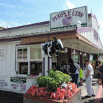 The Purple Cow booth at the Evergreen State Fair. (Courtesy Carrie Neff, Snohomish County Dairy Women)