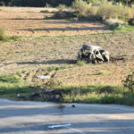 
              FILE - In this Monday, Oct. 16, 2017 file photo, the wreckage of the car of investigative journalist Daphne Caruana Galizia lies next to a road in the town of Mosta, Malta. An independent inquiry into the murder of investigative journalist Daphne Caruana Galizia released on Thursday, July 29, 2021 has found that the Maltese state “has to bear responsibility” for the assassination due the culture of impunity emanating from the highest levels of government. Caruana Galizia’s family had sought the inquiry into the Oct. 16, 2017 car bombing near the family home in Malta.  The murder in the small EU country sent shockwaves felt not just in Malta, but throughout Europe. (AP Photo/Rene Rossignaud, File)
            