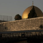 
              The Dome of the Rock mosque is seen above the Mughrabi Bridge, a wooden pedestrian bridge connecting the wall to the Al Aqsa Mosque compound, in Jerusalem's Old City, Tuesday, July 20, 2021. The rickety bridge allowing access to Jerusalem's most sensitive holy site is at risk of collapse, according to experts. But the flashpoint shrine's delicate position at ground-zero of the Israeli-Palestinian conflict has prevented its repair for more than a decade. (AP Photo/Maya Alleruzzo)
            