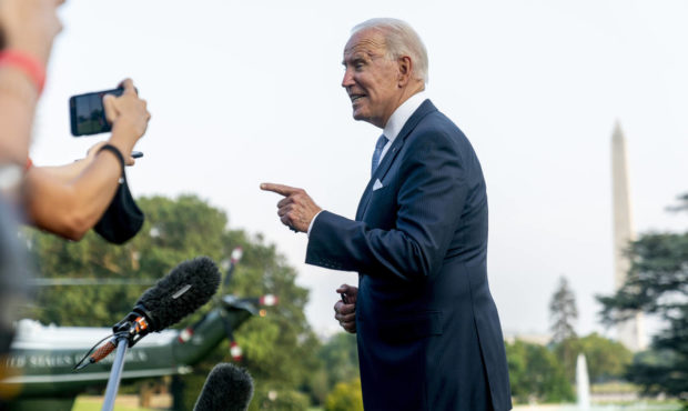 President Joe Biden speaks to members of the media before boarding Marine One on the South Lawn of ...