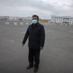 
              Urumqi Public Security Bureau director Zhao Zhongwei stands in a parking lot outside the inmate detention area at the Urumqi No. 3 Detention Center in Dabancheng in western China's Xinjiang Uyghur Autonomous Region on April 23, 2021. (AP Photo/Mark Schiefelbein)
            