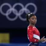 
              File-This July 27, 2021, file photo shows Simone Biles, of the United States, waiting to perform on the vault during the artistic gymnastics women's final at the 2020 Summer Olympics, Tuesday, July 27, 2021, in Tokyo. Biles’ sponsors including Athleta and Visa are lauding her decision to put her mental health first and withdraw from the gymnastics team competition during the Olympics. It’s the latest example of sponsors praising athletes who are increasingly open about mental health issues. (AP Photo/Gregory Bull, File)
            