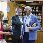 
              President Joe Biden visits the store at King Orchards fruit farm with Sen. Debbie Stabenow, D-Mich., and Sen. Gary Peters, D-Mich., Saturday, July 3, 2021, in Central Lake, Mich. (AP Photo/Alex Brandon)
            