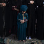 
              Palestinian Muslims attend the prayer of the first day of Eid al-Adha in Gaza City, Tuesday, July. 20, 2021. (AP Photo/Khalil Hamra)
            