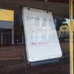 
              A sign stands in a vacant storefront window in Palatka, Fla., Tuesday, April 13, 2021. The town, with a population split almost equally between Black and white, had been devastated by the 2008 Great Recession. Many of its prized murals were fading, and there were more shuttered shops in the old downtown than open. (AP Photo/David Goldman)
            