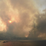 
              Smoke rises during a wildfire near Lampiri village, west of Patras, Greece, Saturday, Jul. 31, 2021. The fire, which started high up on a mountain slope, has moved dangerously close to seaside towns and the Fire Service has send a boat to help in a possible evacuation of people. (AP Photo/Andreas Alexopoulos)
            