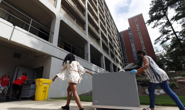 FILE - College students begin moving in for the fall semester at N.C. State University in Raleigh, ...