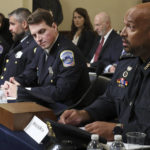 
              U.S. Capitol Police Sgt. Aquilino Gonell, from left, Washington Metropolitan Police Department officer Michael Fanone, Washington Metropolitan Police Department officer Daniel Hodges and U.S. Capitol Police Sgt. Harry Dunn testify before the House select committee hearing on the Jan. 6 attack on Capitol Hill in Washington, Tuesday, July 27, 2021. (Chip Somodevilla/Pool via AP)
            
