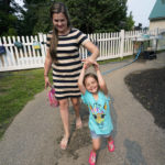 
              In this July 26, 2021 photo, Brianne Walker leaves A Place To Grow daycare with her 3-year-old daughter, Jeannette, in Brentwood, N.H. Walker and her family have qualified for the expanded child tax credit, part of President Joe Biden's $1.9 trillion coronavirus relief package. "The additional money does help alleviate the pressure," said Walker, 29, who took custody of her two siblings last year after her mother overdosed. The $800 credit will help make up for losses she incurred after quitting a kitchen design job to care for her three children, as well as her two younger brothers. (AP Photo/Elise Amendola)
            