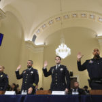 
              U.S. Capitol Police Sgt. Aquilino Gonell, from left, Washington Metropolitan Police Department officer Michael Fanone, Washington Metropolitan Police Department officer Daniel Hodges and U.S. Capitol Police Sgt. Harry Dunn are sworn in before the House select committee hearing on the Jan. 6 attack on Capitol Hill in Washington, Tuesday, July 27, 2021. (Chip Somodevilla/Pool via AP)
            
