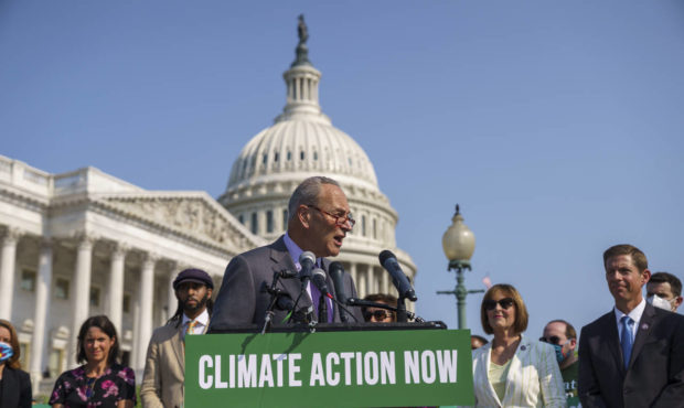 Senate Majority Leader Chuck Schumer, D-N.Y., addresses the urgent need to counter climate change i...