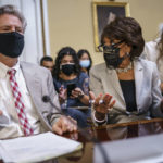 
              House Energy and Commerce Chairman Frank Pallone, D-N.J., left, and House Financial Services Committee Chairwoman Maxine Waters, D-Calif., go over their notes at the House Rules Committee as they prepare an emergency extension of the eviction moratorium, at the Capitol in Washington, Friday, July 30, 2021. President Joe Biden called on "Congress to extend the eviction moratorium to protect such vulnerable renters and their families without delay." (AP Photo/J. Scott Applewhite)
            