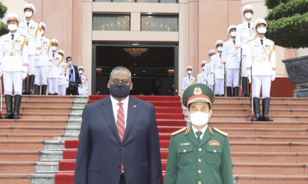 U.S Defense Secretary Lloyd Austin and Vietnamese Defense Minister Phan Van Giang stand for a photo...