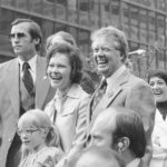 
              FILE - In this July 10, 1976 file photo Jimmy Carter, his wife Rosalynn and daughter Amy, lower left, respond to a huge crowd that welcomed them to New York. Jimmy Carter and his wife Rosalynn celebrate their 75th anniversary this week on Thursday, July 7, 2021. (AP Photo, File)
            