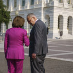
              Speaker of the House Nancy Pelosi, D-Calif., left, and Senate Majority Leader Chuck Schumer, D-N.Y., speak privately before an event to address the need to counter climate change in the US with transformational investments in clean jobs, at the Capitol in Washington, Wednesday, July 28, 2021. (AP Photo/J. Scott Applewhite)
            