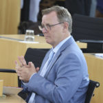 
              Bodo Ramelow, Prime Minister of Thuringia, sits in his seat in the plenary chamber after the vote in Erfurt, Germany, Friday, July 23, 2021.  The far-right Alternative for Germany party failed in an attempt Friday to unseat the left-wing governor of an eastern German state, a long-shot bid that opponents denounced as political theater. (Bodo Schackow/dpa via AP)
            
