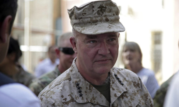 Marine Gen. Frank McKenzie, the head of U.S. Central Command, attends at a ceremony where Gen. Scot...