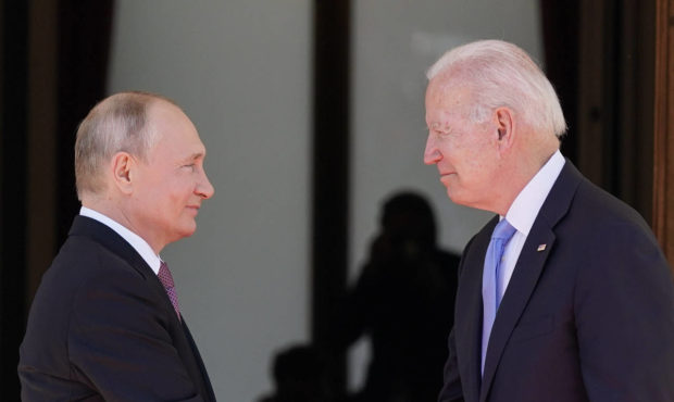 FILE - In this June 16, 2021 file photo, President Joe Biden and Russian President Vladimir Putin, ...
