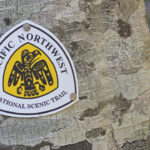 The Pacific Northwest National Scenic Trail thunderbird servicemark is used to mark the route of the trail, and can be found at trail intersections, trailhead kiosks, and road crossings. (Courtesy Pacific Northwest Trail Association)