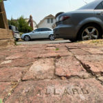 A brick that says “BALLARD” was made in a factory near what’s now Carkeek Park. (Feliks Banel/KIRO Radio)