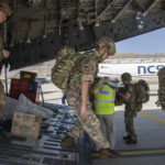 
              In this photo provided by the Ministry of Defence on Sunday, Aug. 15, 2021, members of the 16 Air Assault Brigade arrive in Kabul as part of a 600-strong UK-force sent to assist with Operation PITTING to rescue British nationals in Afghanistan amidst the worsening security situation there. (Leading Hand Ben Shread/Ministry of Defence via AP)
            