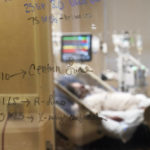 
              Medical notations are written on a window of a COVID-19 patient's room in an intensive care unit at the Willis-Knighton Medical Center in Shreveport, La., Wednesday, Aug. 18, 2021. The windows were added to the doors to keep the rooms closed for quarantining, which would normally be open in an ICU unit there. (AP Photo/Gerald Herbert)
            