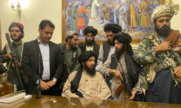 Taliban fighters take control of Afghan presidential palace after the Afghan President Ashraf Ghani...