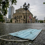 
              FILE - In this Tuesday, July 13, 2021 filer, a face mask sits discarded in front of the Old Opera in Frankfurt, Germany. European nations, across the board, have made strides in their vaccination rates in recent months, with or without incentives. No country has made them mandatory, and campaigns to persuade the undecided are a patchwork. (AP Photo/Michael Probst, File)
            