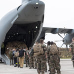 
              In this photo provided by the French Defense Ministry, French soldiers prepare to board a military Airbus A400M to evacuate French citizens from Afghanistan, Monday, Aug.16, 2021 in Orleans, central France. France is relocating its embassy in Kabul to the airport to evacuate all citizens still in Afghanistan, initially transferring them to Abu Dhabi. Evacuations have been in progress for weeks and a charter flight put in place by France in mid-July. (Etat-Major des Armees via AP)
            