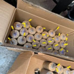 
              FILE - This July 2021 file photo released by the ATF/United States Attorney's Office Central District of California, shows boxes with large illegal  homemade fireworks explosives seized from a home in South Los Angeles. Arturo Ceja III, the man who stockpiled the illegal fireworks in his South Los Angeles backyard — which were later improperly detonated by police, likely causing a massive blast in late June that rocked a neighborhood and injured 17 people — now faces a decade in federal prison. Ceja pleaded guilty Monday, Aug. 30 to one count of transportation of explosives without a license.  (ATF/United States Attorney's Office Central District of California via AP, File)
            