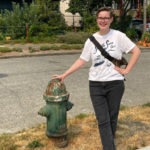 Author and illustrator Susanna Ryan and one of her favorite fire hydrants. (Feliks Banel/KIRO Radio)