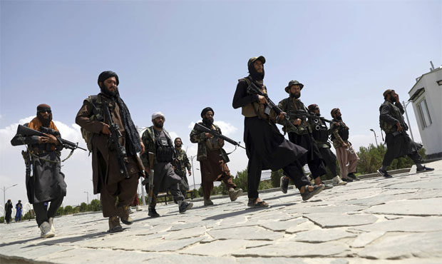 Taliban fighters patrol in Kabul, Afghanistan...