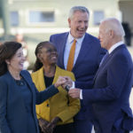 
              President Joe Biden speaks with New York Gov. Kathy Hochul, left, New York Mayor Bill de Blasio and his wife Chirlane McCray, center left, as he arrives at John F. Kennedy Airport for a two day visit to attend the United Nations General Assembly, Monday, Sept. 20, 2021, in New York. (AP Photo/Evan Vucci)
            