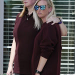 
              Sara Wiles, left, stands with Hollie Skaggs after they both spoke at a prayer vigil at the Collierville Town Hall Friday, Sept. 24, 2021, in Collierville, Tenn. Both Wiles and Skaggs were shopping in a Kroger grocery store Thursday when a gunman attacked, killing one person and injuring others, before he was found dead of an apparent self-inflicted gunshot wound. (AP Photo/Mark Humphrey)
            