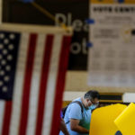 
              A voter casts a ballot for the California recall election at a vote center at Union Station, Tuesday, Sept. 14, 2021, in Los Angeles. (AP Photo/Ringo H.W. Chiu)
            