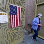 
              A voter leaves after casting her ballot at the Lincoln Park Senior Center in Los Angeles, Tuesday, Sept. 14, 2021. The recall election that could remove California Democratic Gov. Gavin Newsom is coming to an end. Voting concludes Tuesday in the rare, late-summer election that has emerged as a national battlefront on issues from COVID-19 restrictions to climate change. (AP Photo/Ringo H.W. Chiu)
            