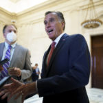 
              Sen. Mitt Romney, R-Utah, talks briefly to reporters after attending a bipartisan barbecue luncheon, at the Capitol in Washington, Thursday, Sept. 23, 2021. Senate Majority Leader Chuck Schumer and House Speaker Nancy Pelosi say they and the White House have agreed to a "framework" to pay for their emerging $3.5 trillion social and environment bill. (AP Photo/J. Scott Applewhite)
            