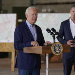 
              President Joe Biden speaks about recent wildfires, at Sacramento Mather Airport, Monday, Sept. 13, 2021, in Mather, Calif., as California Gov. Gavin Newsom listens. (AP Photo/Evan Vucci)
            