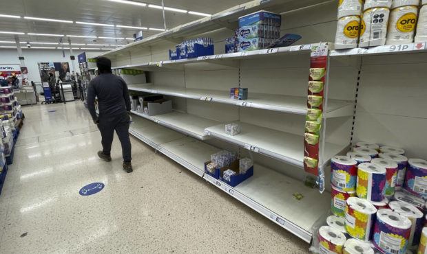 A view of empty shelves at a supermarket in London, Monday, Sept. 20, 2021. Retailers, manufacturer...