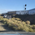 
              In this photo provided by Kimberly Fossen an ambulance is parked at the scene of an Amtrak train derailment on Saturday, Sept. 25, 2021, in north-central Montana. Multiple people were injured when the train that runs between Seattle and Chicago derailed Saturday, the train agency said. (Kimberly Fossen via AP)
            