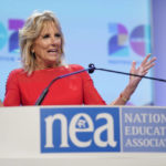 
              FILE - In this July 2, 2021, file photo first lady Jill Biden speaks at the National Education Association's annual meeting at the Walter E. Washington Convention Center in Washington. Biden is going back to her whiteboard. After months of teaching writing and English to community college students in boxes on a computer screen, the first lady resumes teaching in person on Tuesday, Sept. 7 from a classroom at Northern Virginia Community College, where she has worked since 2009.  (AP Photo/Patrick Semansky, File)
            