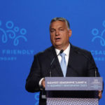 
              Hungary's Prime Minister Viktor Orban holds a speech during the 4th Budapest Demographic Summit in Budapest, Hungary, Thursday, Sept. 23, 2021. The biannual demographic summit, which was first organized in 2015, offers a forum for "pro-family thinker" decision-makers, scientists, researchers, and church representatives of the same sort to exchange their thoughts about connections between demographics and sustainability. (AP Photo/Laszlo Balogh)
            