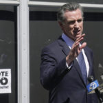 
              Gov. Gavin Newsom speaks to reporters in San Francisco, Tuesday, Sept. 14, 2021. The recall election that could remove California Democratic Gov. Newsom is coming to an end. Voting concludes Tuesday in the rare, late-summer election that has emerged as a national battlefront on issues from COVID-19 restrictions to climate change. (AP Photo/Jeff Chiu)
            