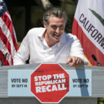 
              California Gov. Gavin Newsom campaigns against the recall election at Culver City High School in Culver City, Calif., Saturday, Sept. 4, 2021. (AP Photo/Damian Dovarganes)
            